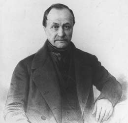 Retrato de medio cuerpo de Augusto Comte.